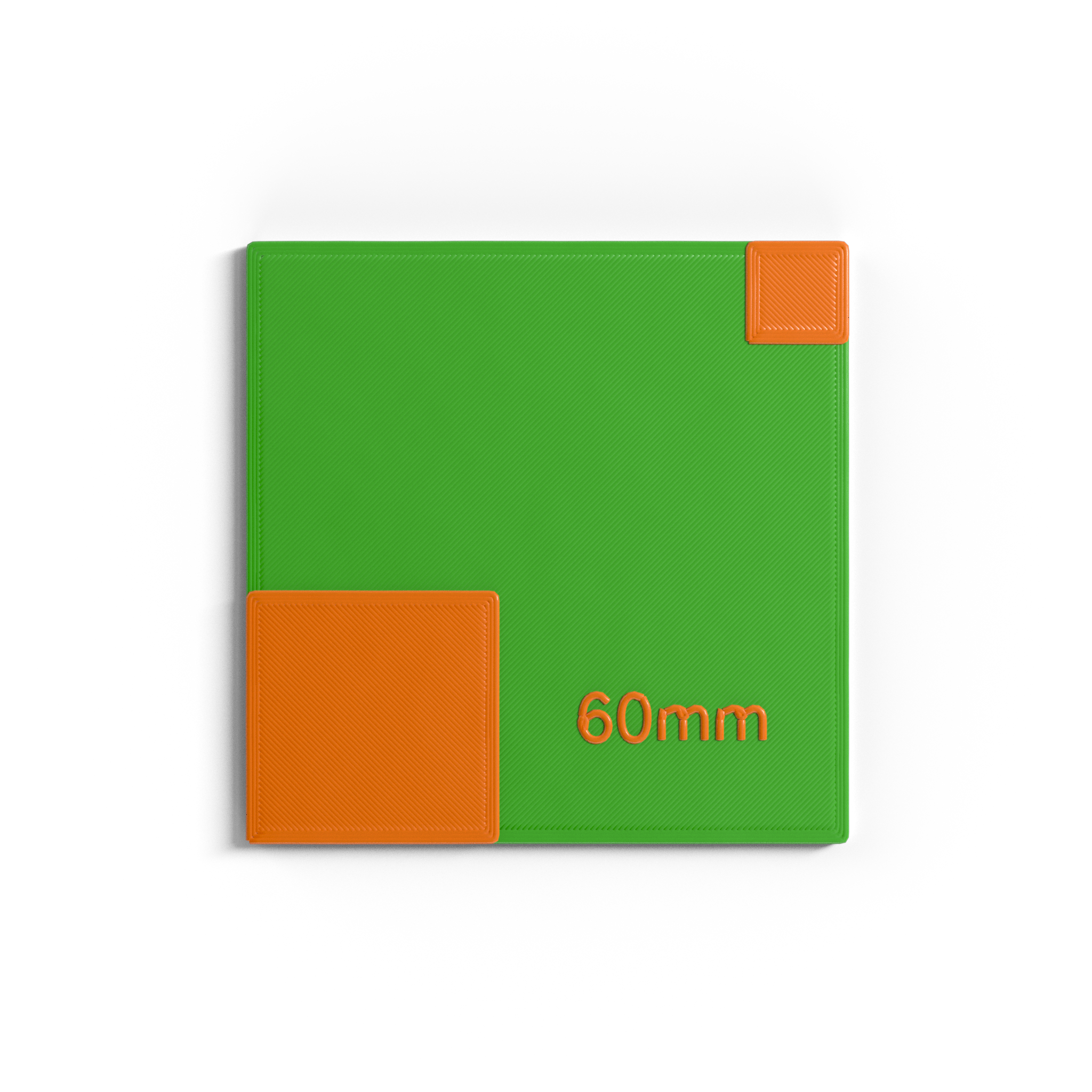 Square VFX tracking marker, green with orange asymmetric pattern and 60mm text.